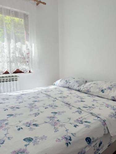 Ένα ή περισσότερα κρεβάτια σε δωμάτιο στο Apartment Green Heaven