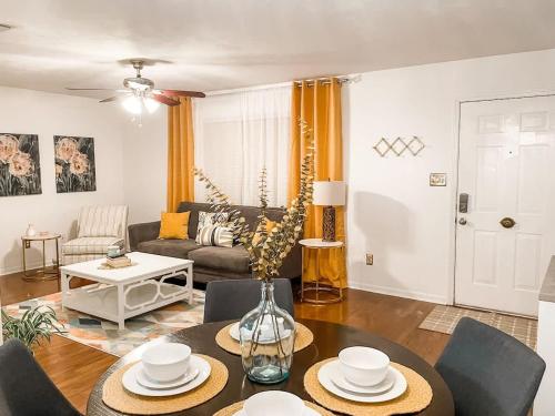 a living room with a table and chairs at Tally Town Gem 2bdr 2 Ba townhome in Perkins