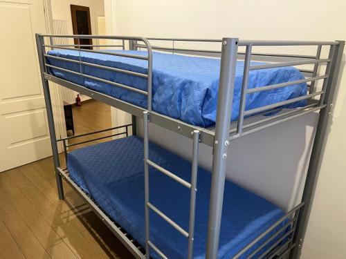 a couple of bunk beds in a room at La bella Flora in Ariccia