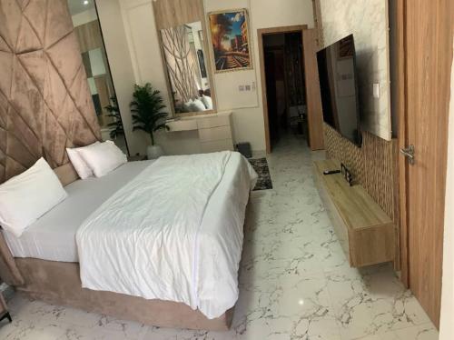 Nins Lux suitesにあるテレビまたはエンターテインメントセンター