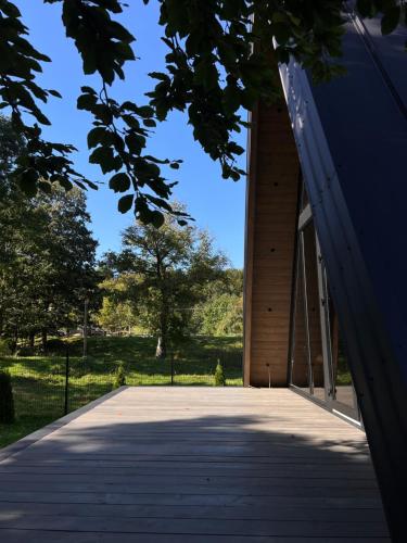 a walkway leading to the entrance to a building at Grehit House in Kozmacz
