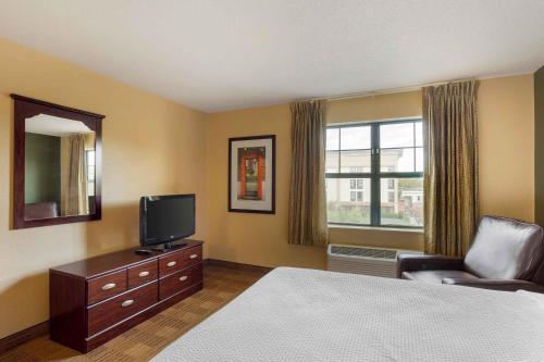 a hotel room with a bed and a television at Extended Stay America Suites - Philadelphia - Mt Laurel - Crawford Place in Mount Laurel