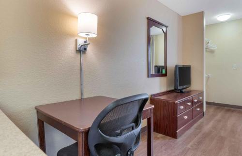 a room with a desk with a chair and a television at Extended Stay America Suites - Philadelphia - Mt Laurel - Crawford Place in Mount Laurel
