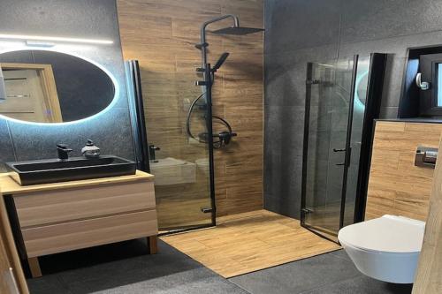 Ένα μπάνιο στο Family-friendly holiday home in Mielenko