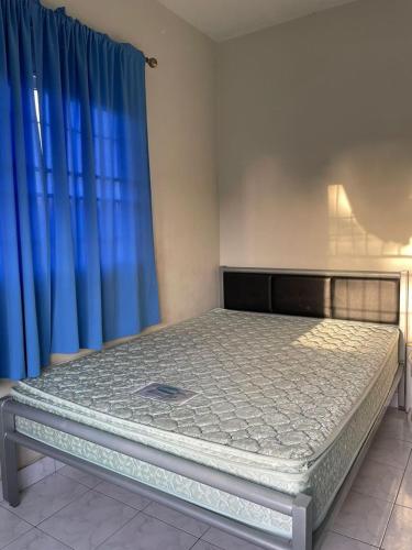 Llit o llits en una habitació de Kwatta Comfort