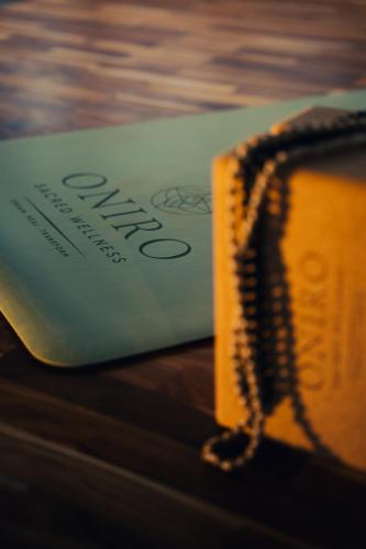 a book sitting on top of a table at Divino Gili Air in Gili Air