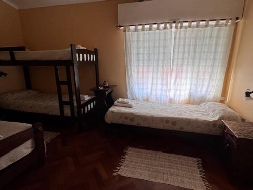 Postel nebo postele na pokoji v ubytování Hotel Ideal