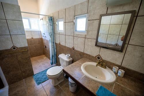 Ένα μπάνιο στο Casa Hokol penthouse departamento con alberca