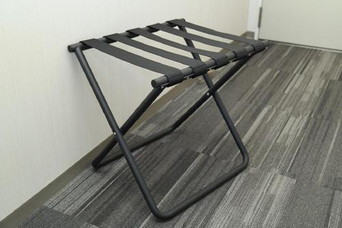 a black metal chair sitting on the floor at Washington R&BHotel TokyoToyocho in Tokyo