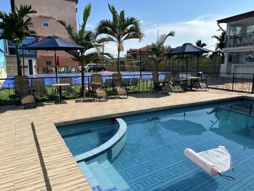 Kolam renang di atau dekat dengan Primeshare Luxury Apartments with Swimming Pool, Reliable Wi-Fi & Air Conditioning