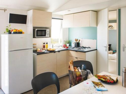 Gallery image of Mobil home avec Terrasse, 3 Chambres, 6 Personnes - Lons-le-Saunier - API-1-52-446 in Chille