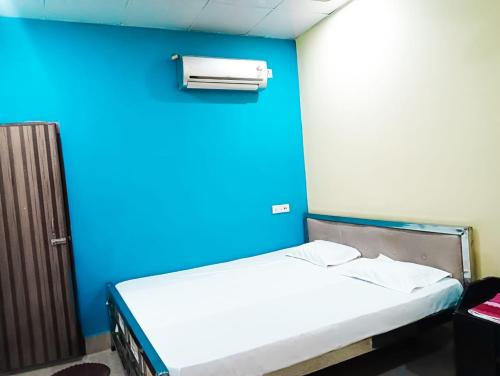 Krevet ili kreveti u jedinici u okviru objekta Triptire Resort & Kaziranga