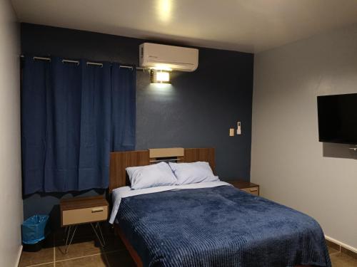 Ένα ή περισσότερα κρεβάτια σε δωμάτιο στο NSI Casa Entera en La Piedad