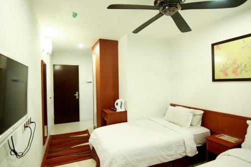 Cama o camas de una habitación en AG Hotel Penang