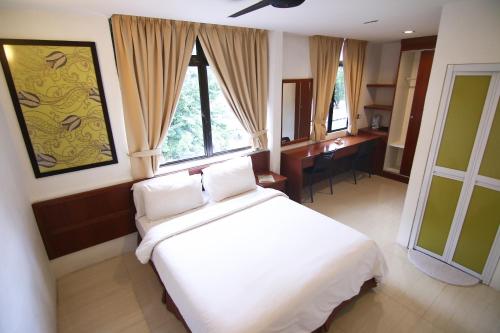 Cama o camas de una habitación en AG Hotel Penang