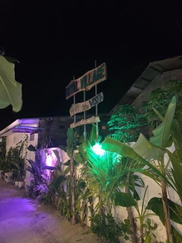 a street sign with a green traffic light at ROYAL VILLAGE inn Dhangethi Maldives in Dhangethi