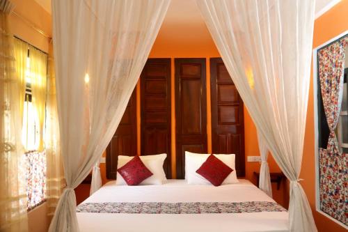 Кровать или кровати в номере Villa Ceylon