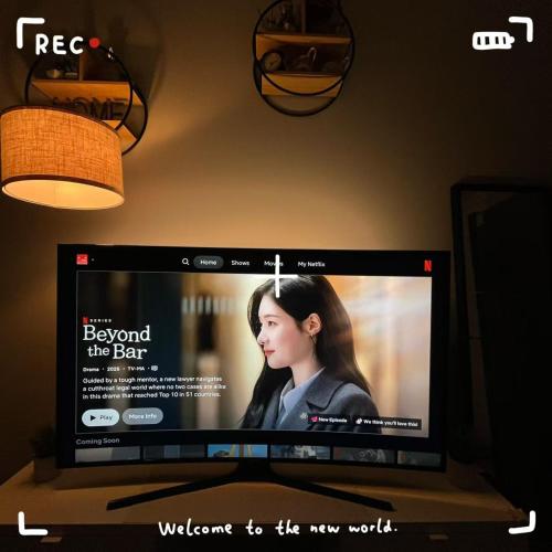a television screen with a movie projected on it at Cozy Private suite-Free parking-Netflix-Separate entrance-Self Check in in Richmond