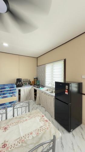 Η κουζίνα ή μικρή κουζίνα στο Chatek Family Inn