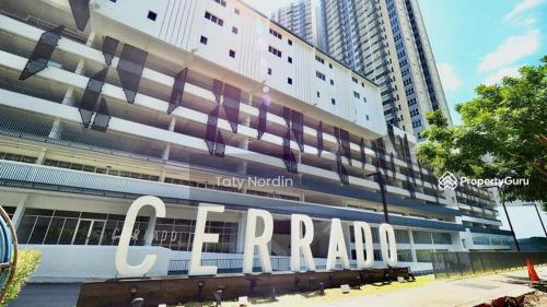 a large building with the word carma written on it at Homez Sky Cerrado Southville in Kampung Dengkil