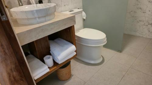 Koupelna v ubytování Kawitris Hidden Homestay