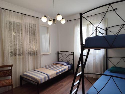 Ένα ή περισσότερα κρεβάτια σε δωμάτιο στο Appartement Near Beach & Center