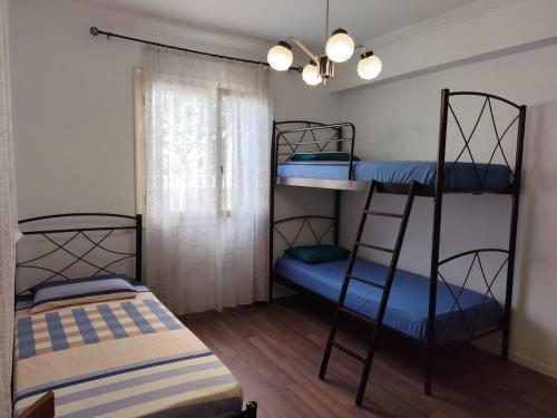 Ένα ή περισσότερα κρεβάτια σε δωμάτιο στο Appartement Near Beach & Center