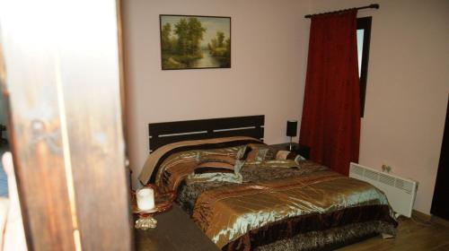 Postel nebo postele na pokoji v ubytování Softades Cottage