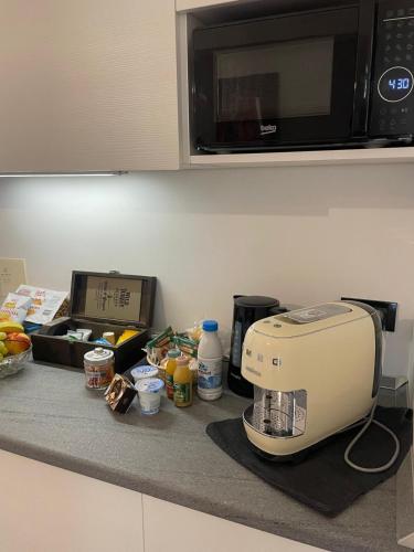 Kuchyň nebo kuchyňský kout v ubytování M&J house