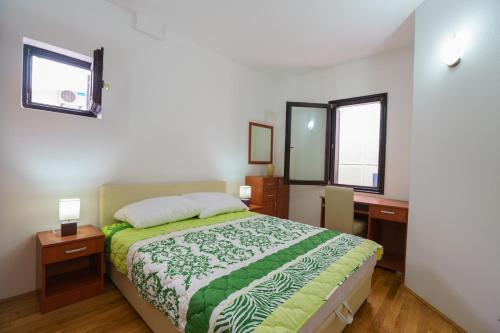 Apartments Zezeljにあるベッド