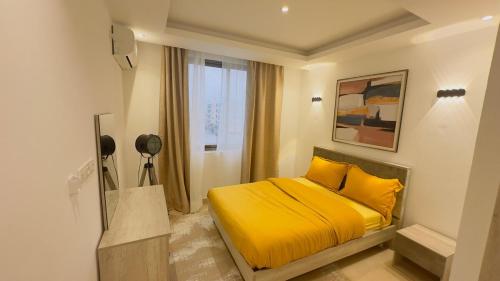 Llit o llits en una habitació de flamboyant