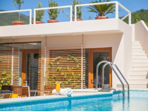 a swimming pool with a rubber duck in a house at Hotel Casa del Mare - Blanche in Herceg-Novi