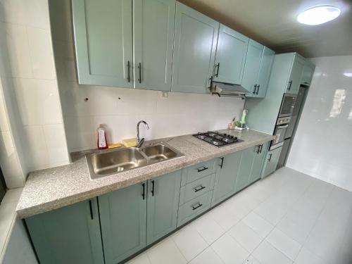 מטבח או מטבחון ב-Lilas appartement