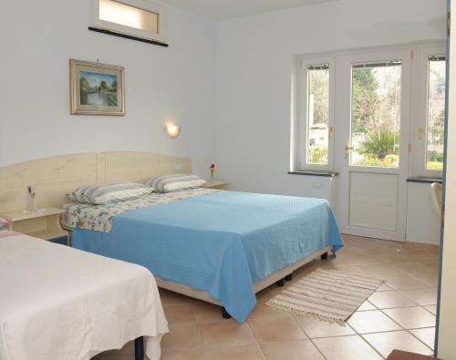 Cama o camas de una habitación en Il Cottage B&B