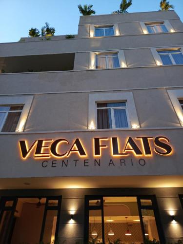 a sign on the front of a building at Veca Flats Centenario in Cali