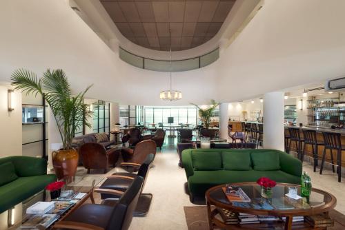 Un lugar para sentarse en Lily & Bloom Boutique Hotel