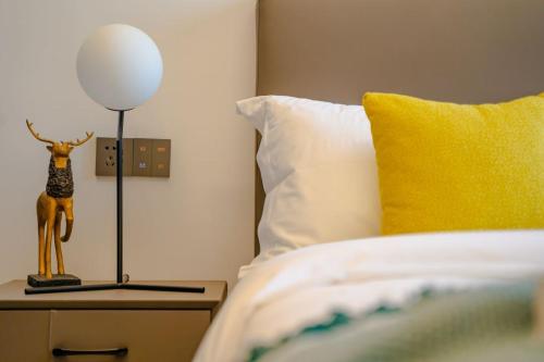 Shenzhen Universiade Center Wisdom Forest Hotelにあるベッド