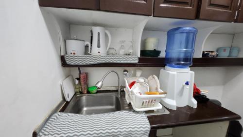 Η κουζίνα ή μικρή κουζίνα στο Happy Stay Baguio 2BR