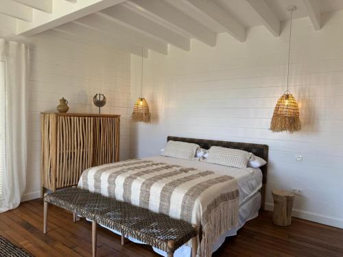 Ένα ή περισσότερα κρεβάτια σε δωμάτιο στο Akine Lodge