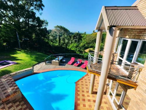Bazén v ubytování Palm Valley Inn - Port Elizabeth nebo v jeho okolí