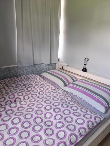 Una cama o camas en una habitación de Apartmán Na Kvildě