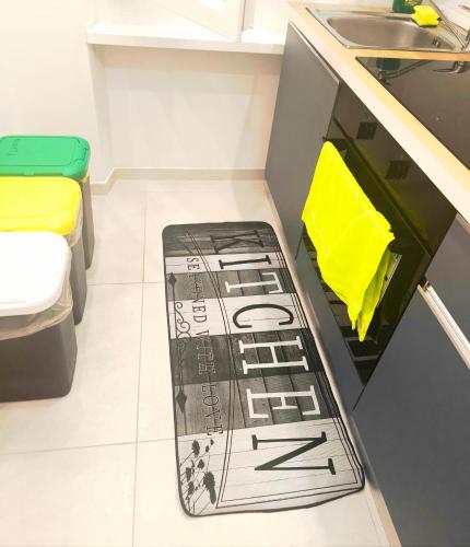 a kitchen with a stove in the floor at Modern and quiet apartment in Rome