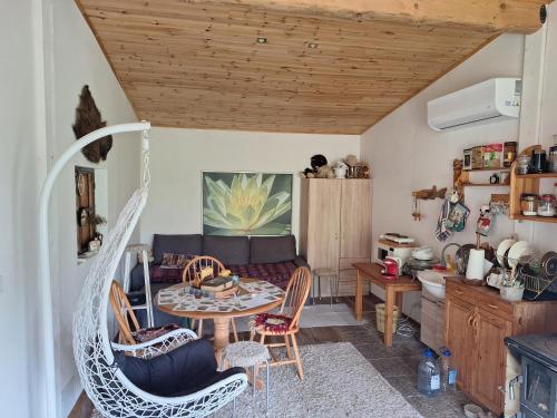 a living room with a table and chairs at Aaviku Holiday Home in Eiste
