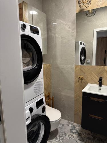 Ένα μπάνιο στο Apartament Puck Holliday