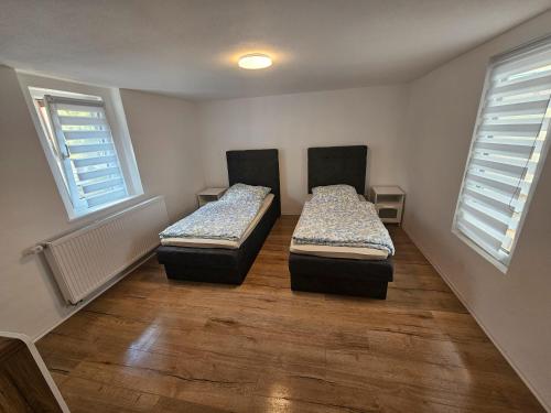 Postel nebo postele na pokoji v ubytování Apartament by B