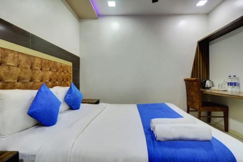 Ένα ή περισσότερα κρεβάτια σε δωμάτιο στο Hotel Mumbai Terminal