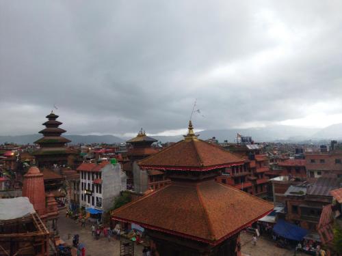 an overhead view of a city with buildings and roofs at HOTEL RUPAKOT AND ROOFTOP RESTAURANT in Bhaktapur