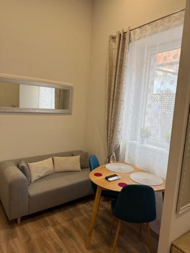 Posezení v ubytování Gatto Rosso Apartman Esztergom