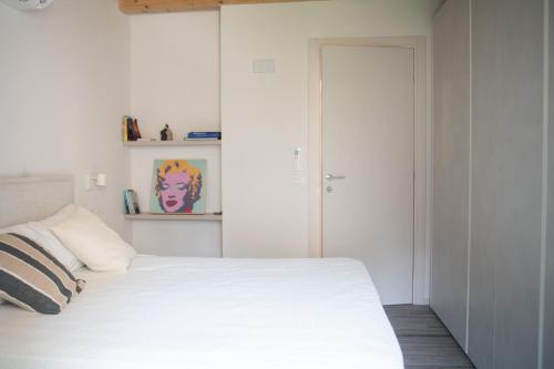 Katil atau katil-katil dalam bilik di Borgo Gemona Luxury Suites