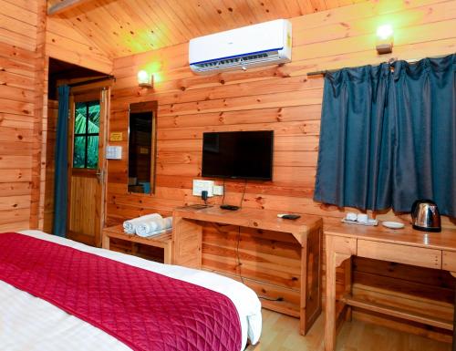 Televiisor ja/või meelelahutuskeskus majutusasutuses The Plix Resort